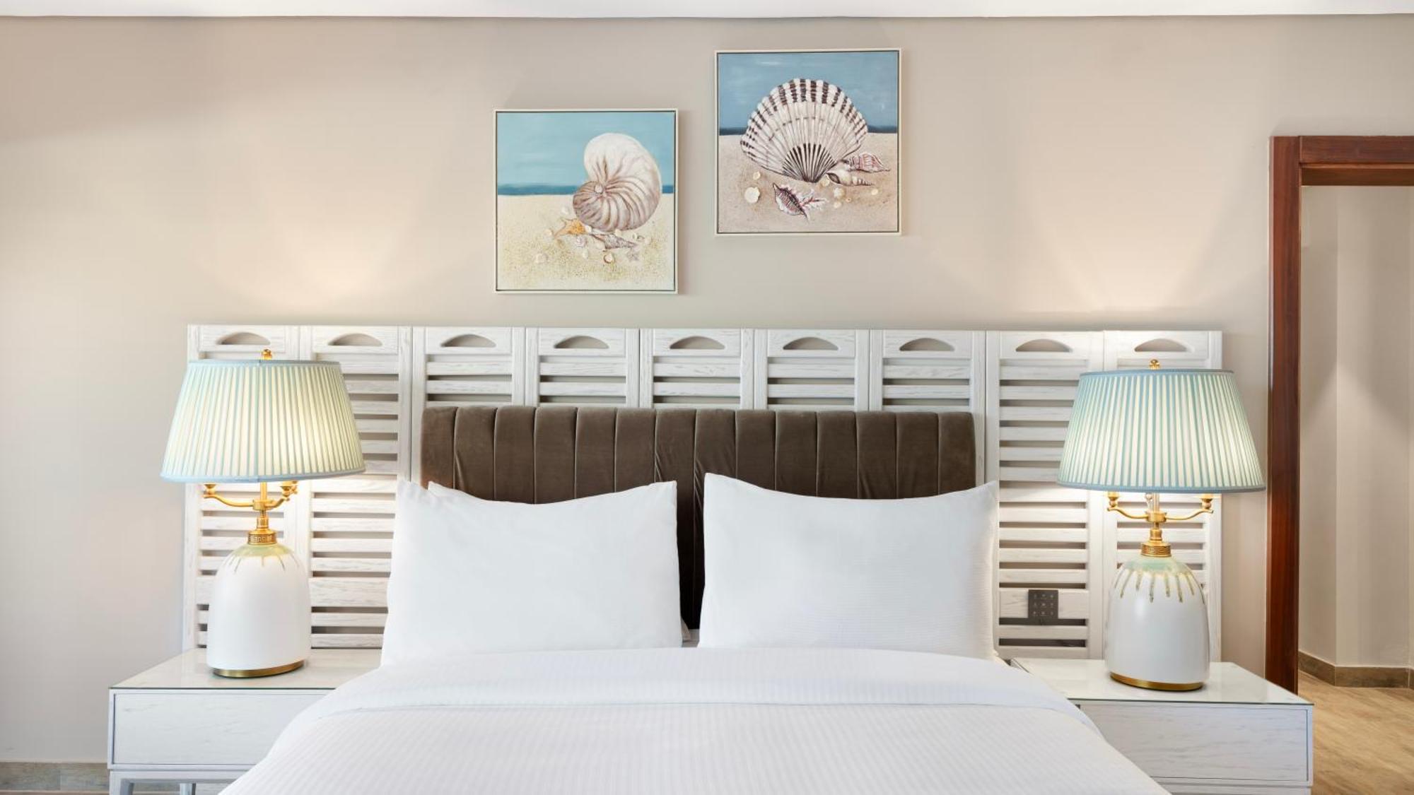 Rixos Premium Alamein El-Alamein Værelse billede A bedroom at Hilton Garden Inn